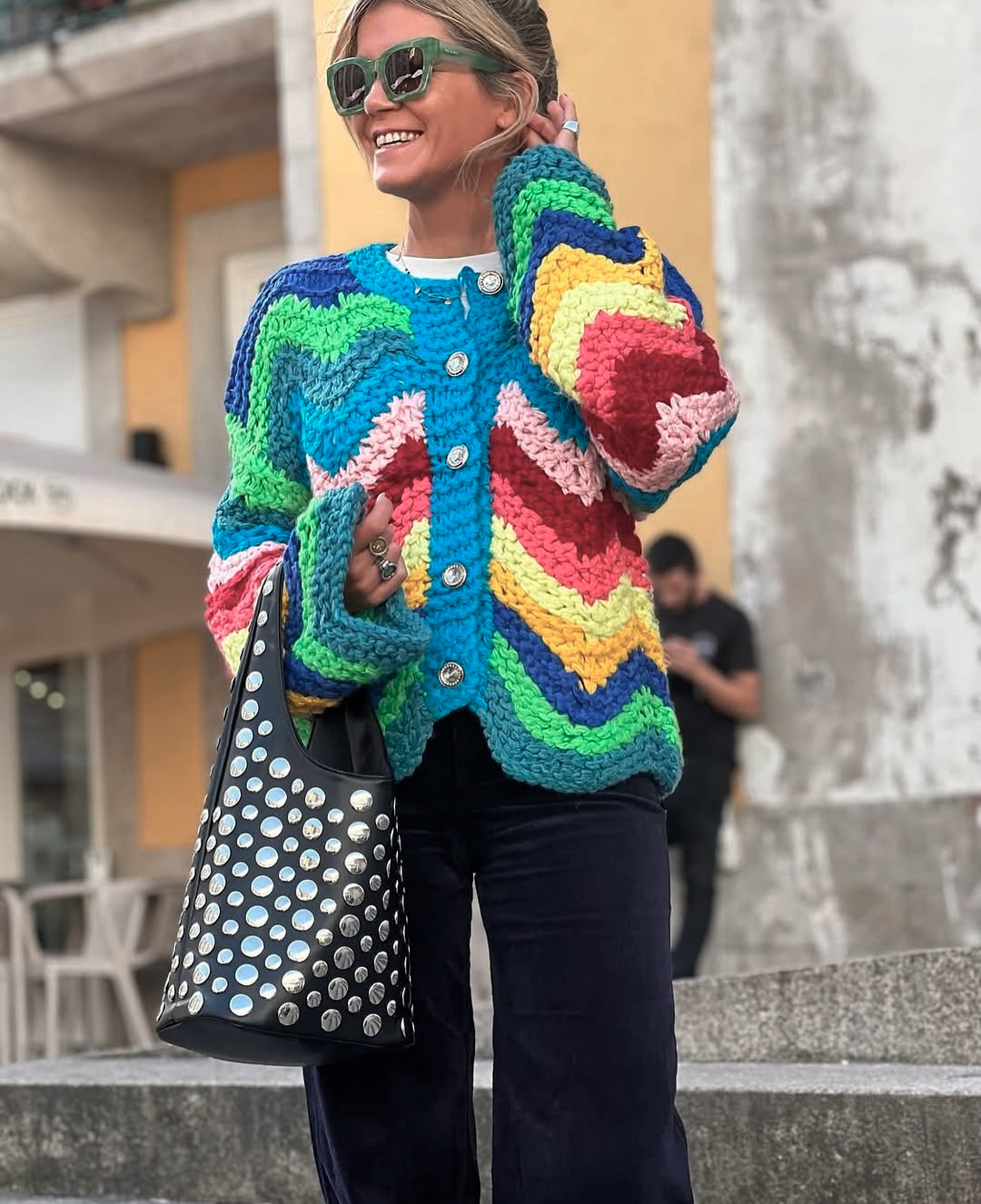 Colorful knitted cardigan in rainbow colors