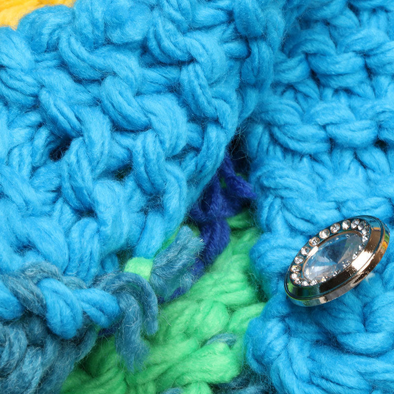 yarn and button detail of the knitted cardigan